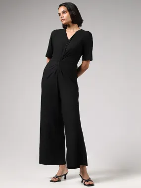 Wardrobe Solid Black V-Neck Jumpsuit